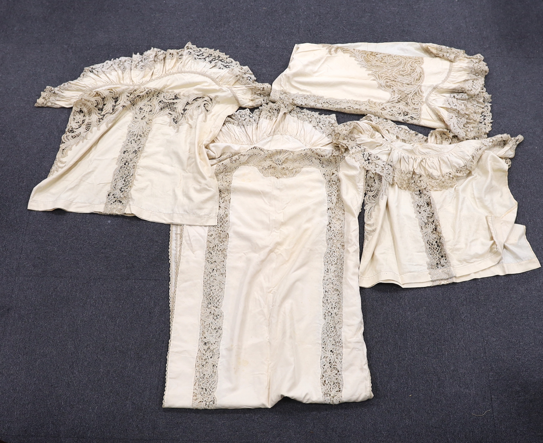 One long cream silk curtain decorated with tape lace insertions and frilled border, 226cm long x 134cm wide, together with three small curtains, 135cm x 74cm deep